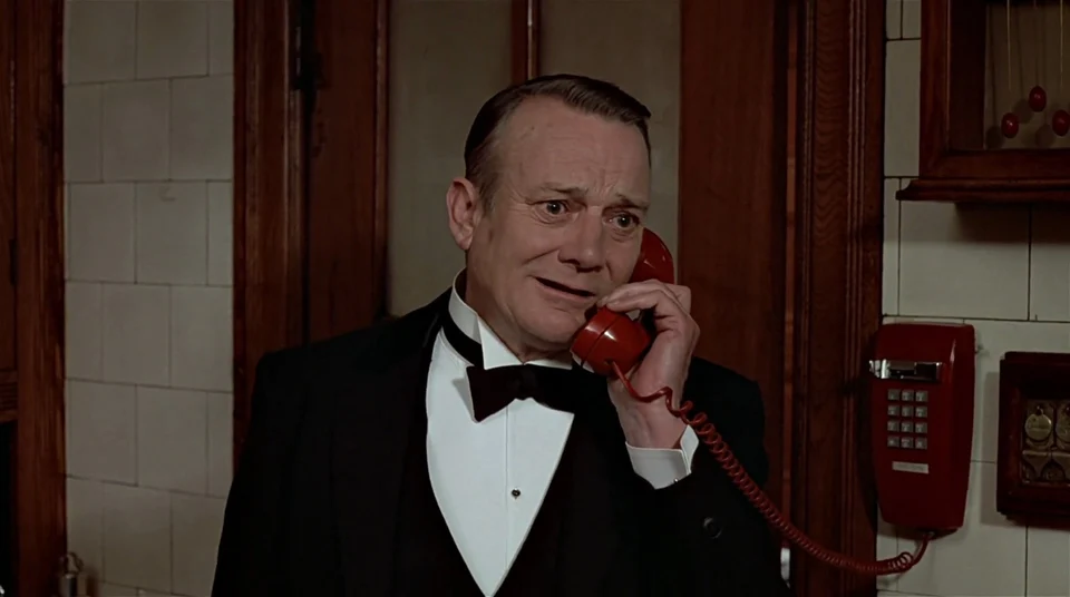 Denholm Elliott as Coleman in Trading Places (1983)